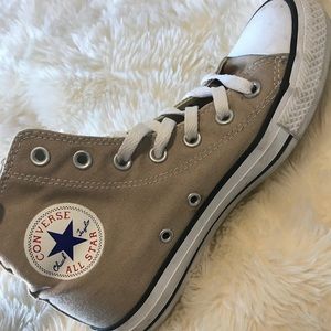 Tan women’s high top converse